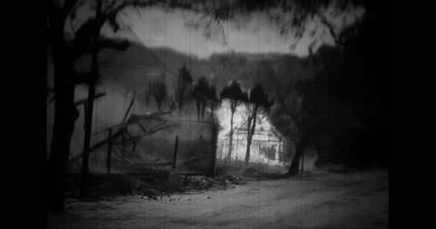 View of hut burning during war Stock Footage 43458361