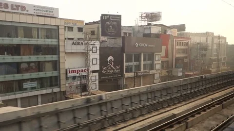 View of the Hyderabad city as seen from inside a train in Hyderabad,India Stock Footage 83192136