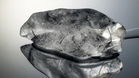 View of Ice Melting on a mirror background. Stock Footage 169210082