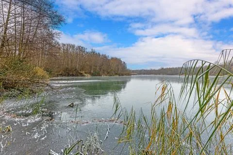 View of the ice surface of the draught frozen lake Oberwaldsee during the day Stock-Fotos
