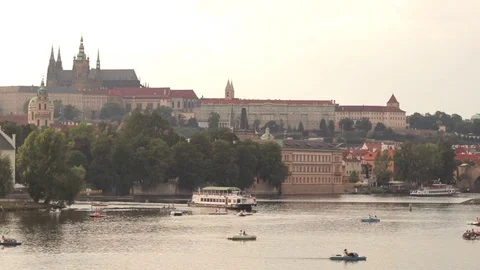 A view of iconic Prague Castle and Vltava  river in the evening - cityscape Video stock 84173323