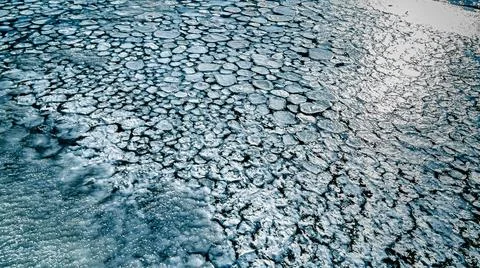 View of the icy patterns in the river Stock Photos