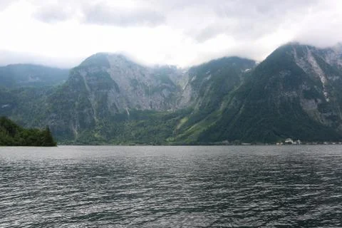View idyllic Alpine mountains and lake in Hallstatt Stock Photos
