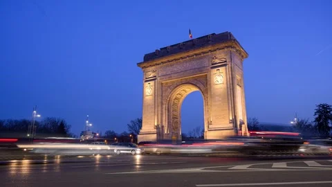 View of the illuminated Arcul de Triumf at twilight in Bucharest, Romania. Stock Footage 335600973