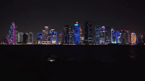 View of the illuminated Doha skyline at night in Qatar. Stock Footage 339914916