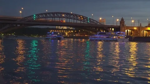 View of illuminated night river ,bridge and the embankment Stock Footage 76240188