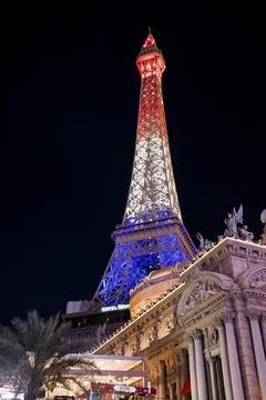 View of illuminated Replica of Eiffel Tower and Paris Las Vegas Hotel at night Stock Photos