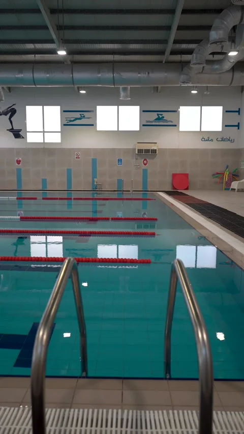 View of an indoor swimming pool in Doha, Qatar. Stock Footage 339914707