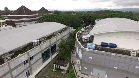 A view of an industrial building from above using a drone Video stock 220081360