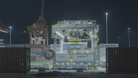 View of industrial dock through containers loaded on train Video stock 199534059
