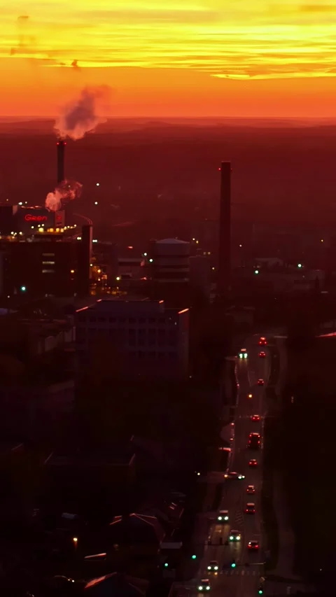View of industrial facility with smoking chimneys, LATVIA. Stockbeeldmateriaal 339900137