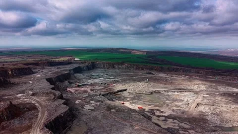 View of industrial granite quarry activity in open landscape Stock Footage 337862714