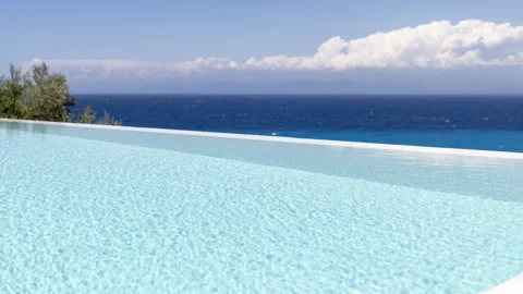 View of an infinity pool and sea and sky Stock-Footage 314848293