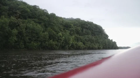 View from an inflatable boat to a mountain river with rain Stock Footage 120492797
