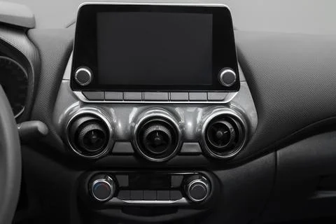 View of infotainment system and climate controls in modern car, closeup Stock Photos
