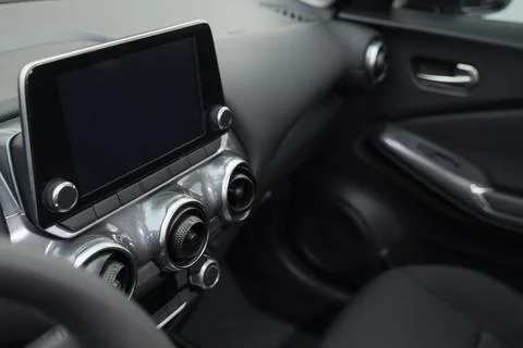 View of infotainment system and climate controls in modern car, closeup Stock Photos