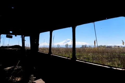 View from inside of an abandoned and rusty old Soviet Russian bus in Armenia Stock Photos