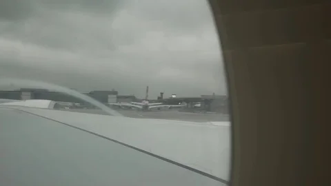 View from inside aircraft taking off London Vídeo Stock 77646539