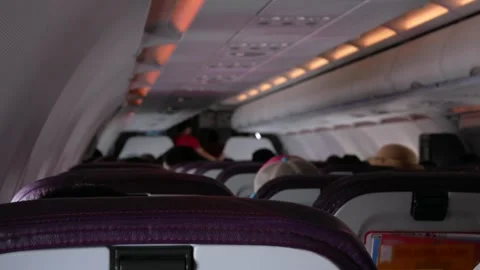 View inside airplane aircraft selective foccusing with many seats in rows i.. 스톡 동영상 283055871