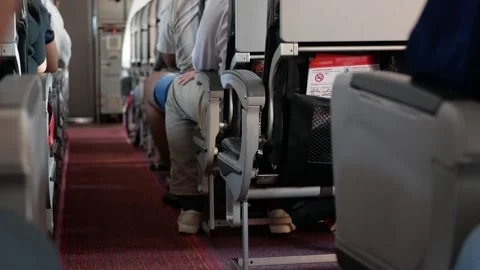 View inside airplane aircraft through aisle pathway on the plane to safety .. Stock Footage 277871976