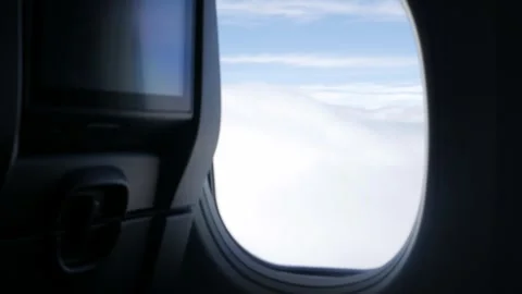 View inside airplane aircraft through plane window with aircraft seat in ca.. Stock Footage 316392440