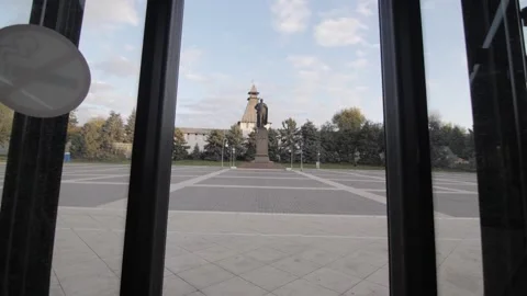 View from inside a bus through the doors about to open Stock Footage 253705324
