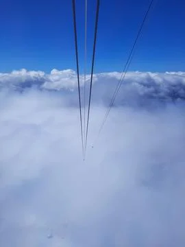 View from inside the cabin on the cable car when climbing Mount Zugspitze in Stock Photos