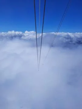 View from inside the cabin on the cable car when climbing Mount Zugspitze in Stock Photos