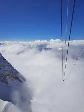 View from inside the cabin on the cable car when climbing Mount Zugspitze in Stock Photos