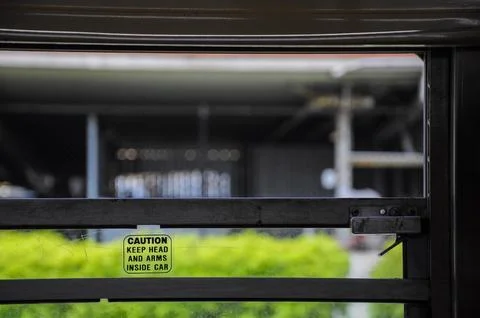 View from inside a cable car with safety sign, San Francisco. Stock Photos
