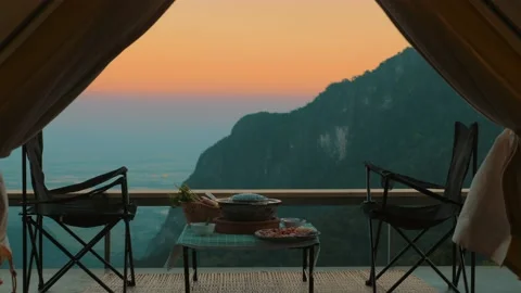View from inside camp tent. Amazing sunset time in mountains Видео 221264677