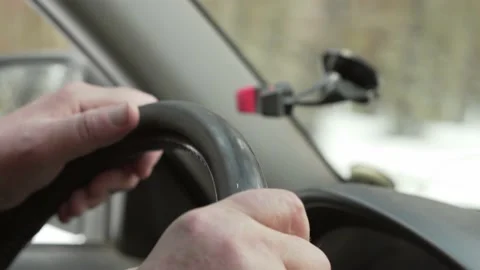 View from inside the car, the driver drives the car through the winter forest. Stock Footage 150315627