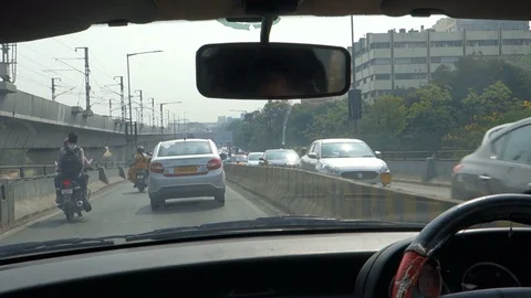 View from inside a car driving on india city road Stock Footage 87469646