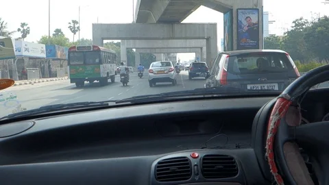 View from inside a car driving on india city road Stock Footage 87469730