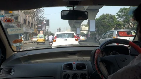 View from inside a car driving on india city road Stock Footage 87469875