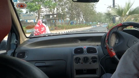 View from inside a car driving on india city road Stock Footage 87469973