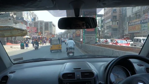 View from inside a car driving on india city road Stock Footage 87505528