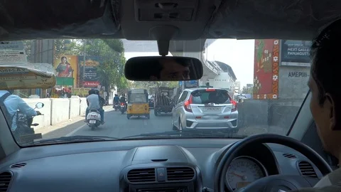 View from inside a car driving on india city road Stock Footage 87505687