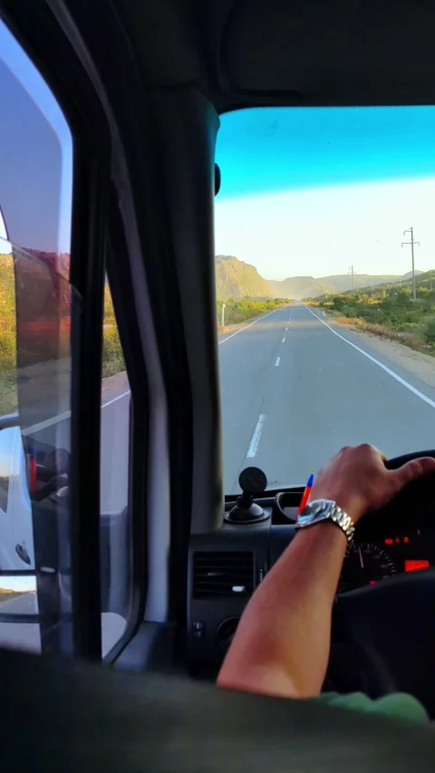 View from inside car on hilly road. Beautiful landscapes of northern nature. Stock Footage 297554302