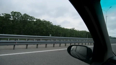 A view from the inside of the car from the passenger seat of a right-hand drive  Video stock 162631141