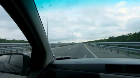 A view from the inside of the car from the passenger seat of a right-hand drive  Stock Footage 162631701
