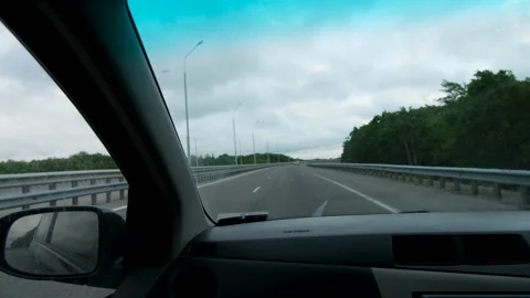 A view from the inside of the car from the passenger seat of a right-hand drive  Stock Footage 162631767
