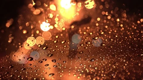 View from inside the car of Rainwater drops Falling Down On the car glass Stockbeeldmateriaal 251946200