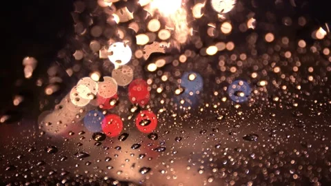 View from inside the car of Rainwater drops Falling Down On the car glass Stockbeeldmateriaal 251946592