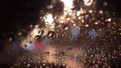 View from inside the car of Rainwater drops Falling Down On the car glass 스톡 동영상 251946632