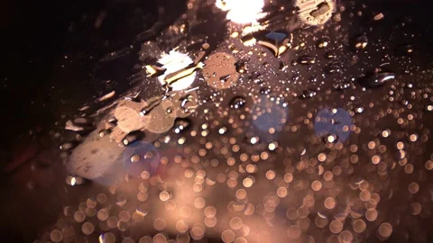 View from inside the car of Rainwater drops Falling Down On the car glass Stockbeeldmateriaal 251946982
