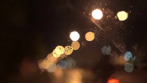 View from inside the car of Rainwater drops Falling Down On the car glass Stockbeeldmateriaal 251948138