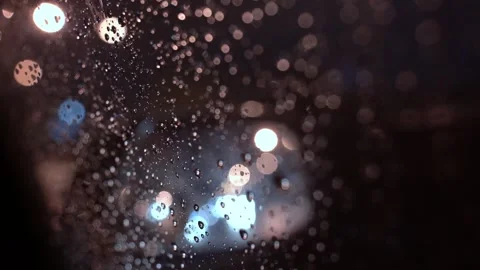 View from inside the car of Rainwater drops Falling Down On the car glass Stockbeeldmateriaal 251949015