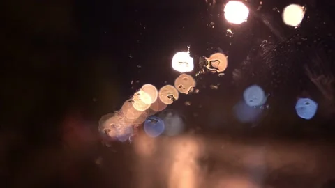 View from inside the car of Rainwater drops Falling Down On the car glass Stockbeeldmateriaal 251949026