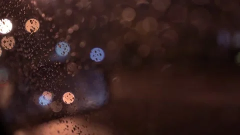 View from inside the car of Rainwater drops Falling Down On the car glass Stockbeeldmateriaal 251949051
